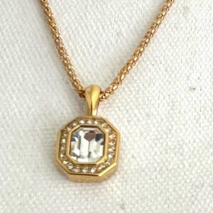 S.A.L. Swarovski crystal signed gold tone pendant